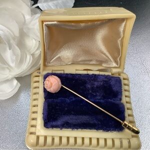 Carved coral rose pin